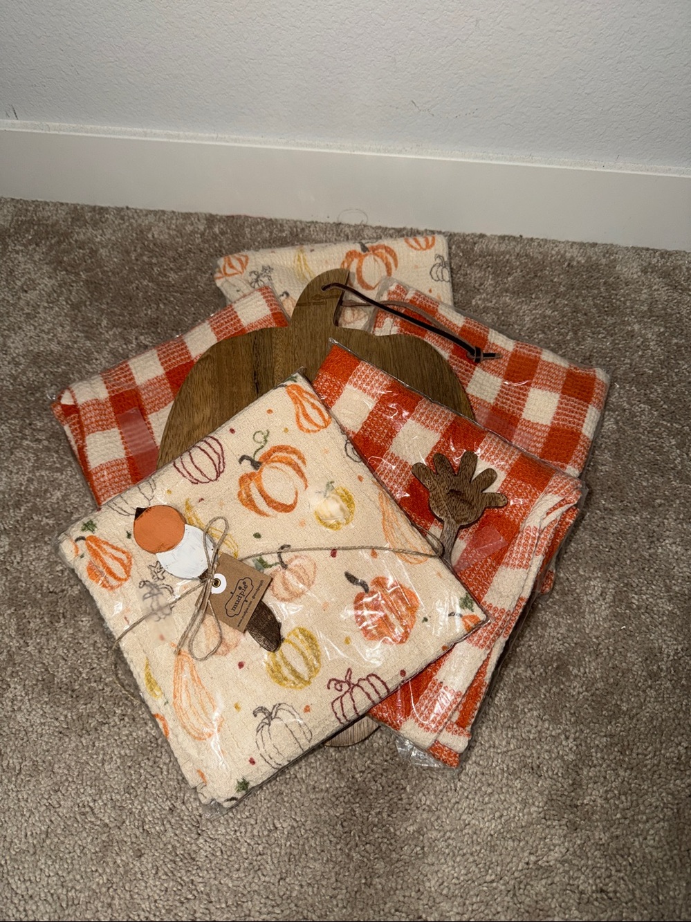 Set of 5 towels and pumpkin cutting board by Mud Pie